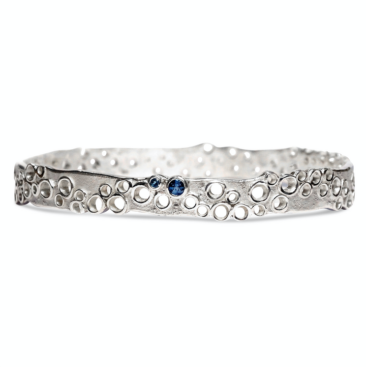 Erosion bangle, London and Swiss Blue Topaz
