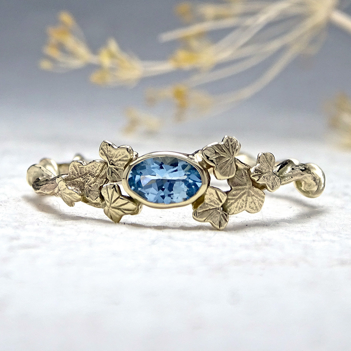 Entwining Ivy leaves ring with Aquamarine