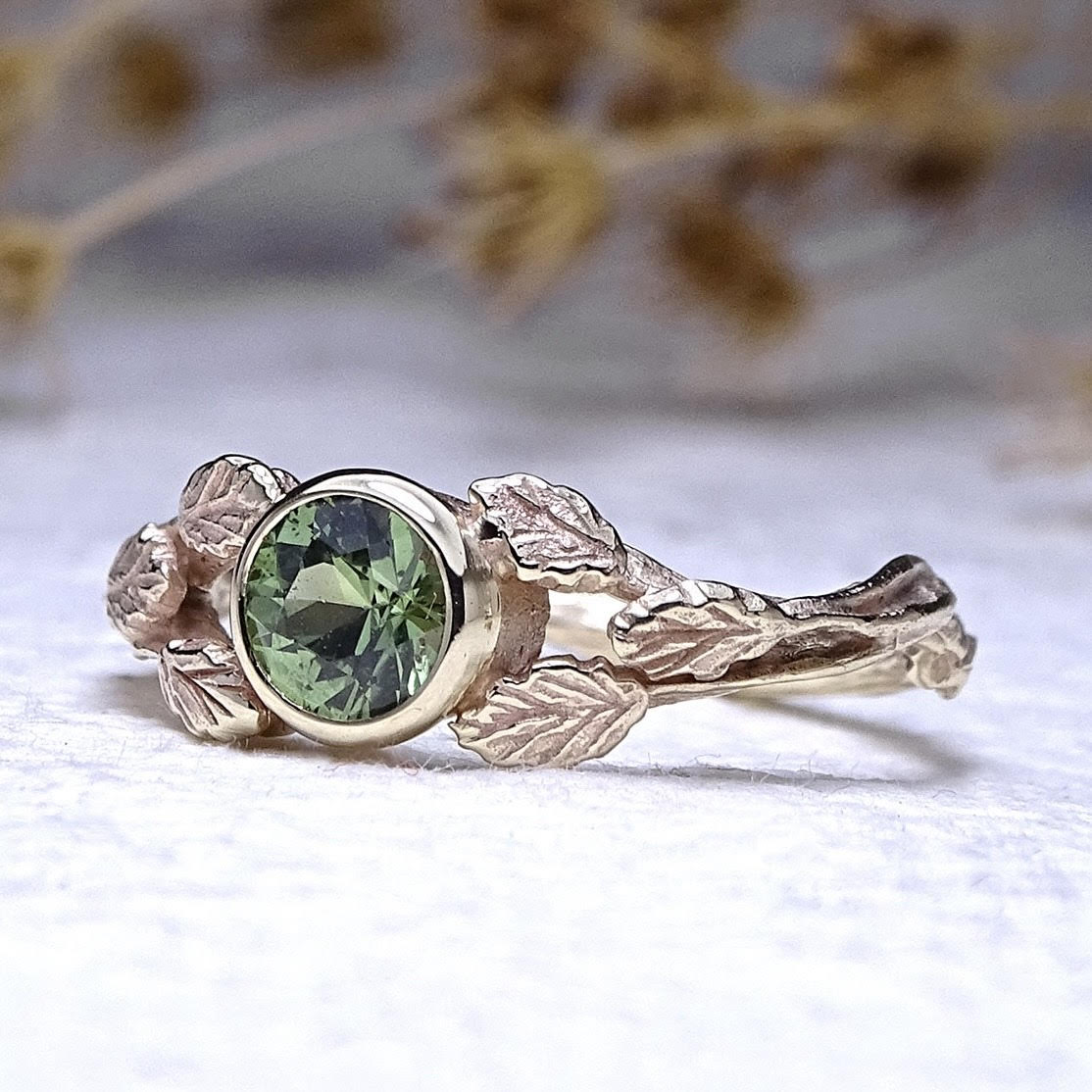 Entwining Leaves ring, 5mm Green Sapphire, 9ct yellow gold