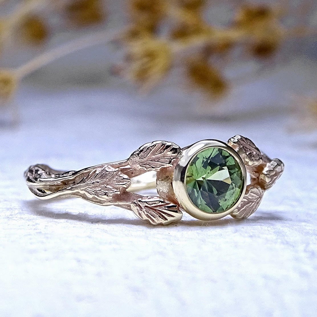 Entwining Leaves ring, 5mm Green Sapphire, 9ct yellow gold