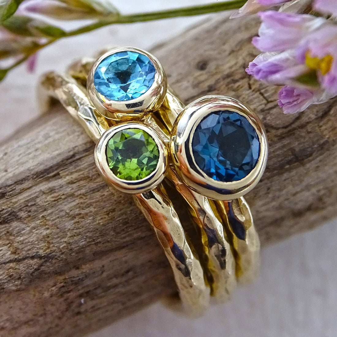 Pebble ring stack, 4.50mm London Blue Topaz, 4.00mm Swiss Blue Topaz, 3.50mm Green Tourmaline, 9ct gold