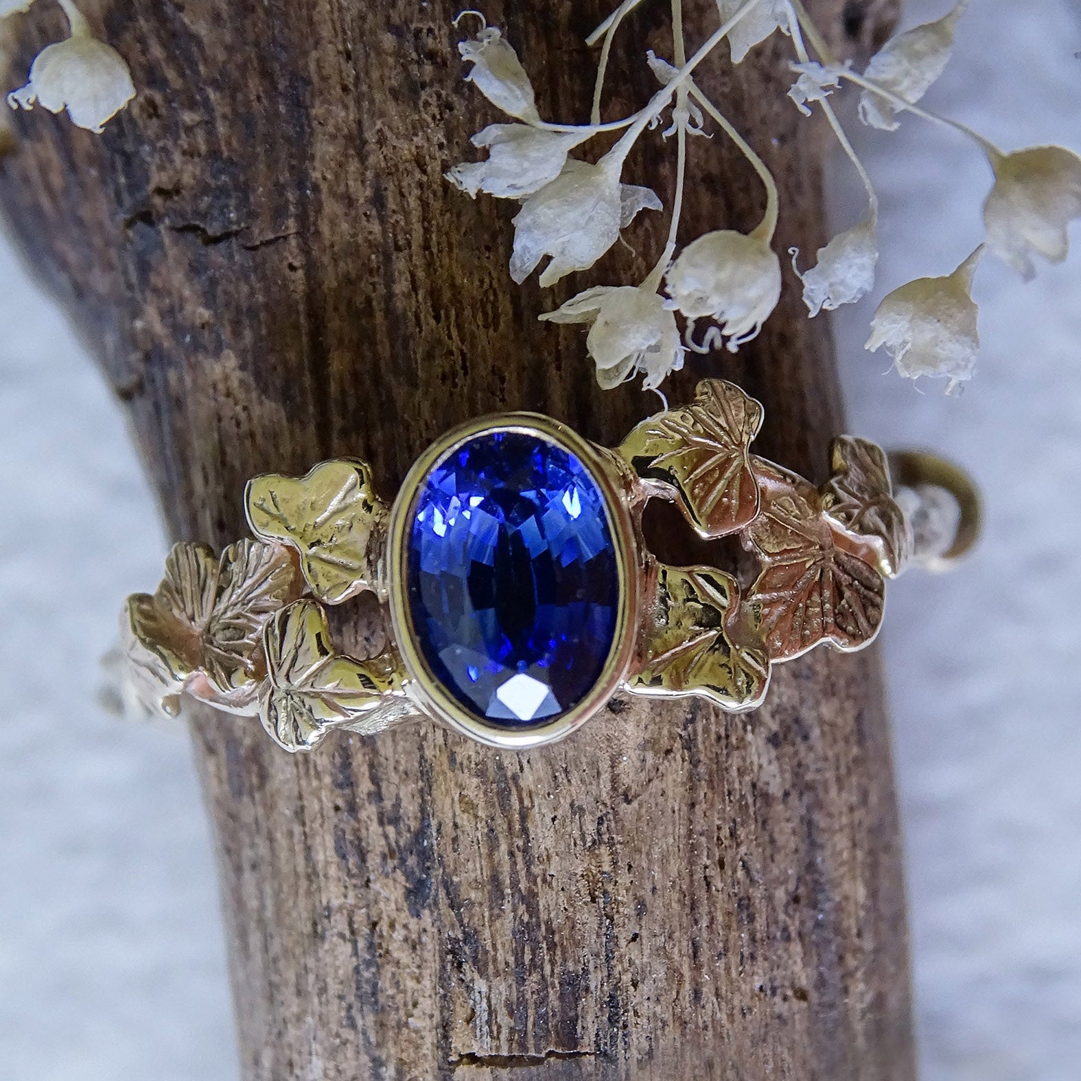 Entwining Ivy Leaves ring, 6mm x 4mm Sapphire, 9ct yellow gold