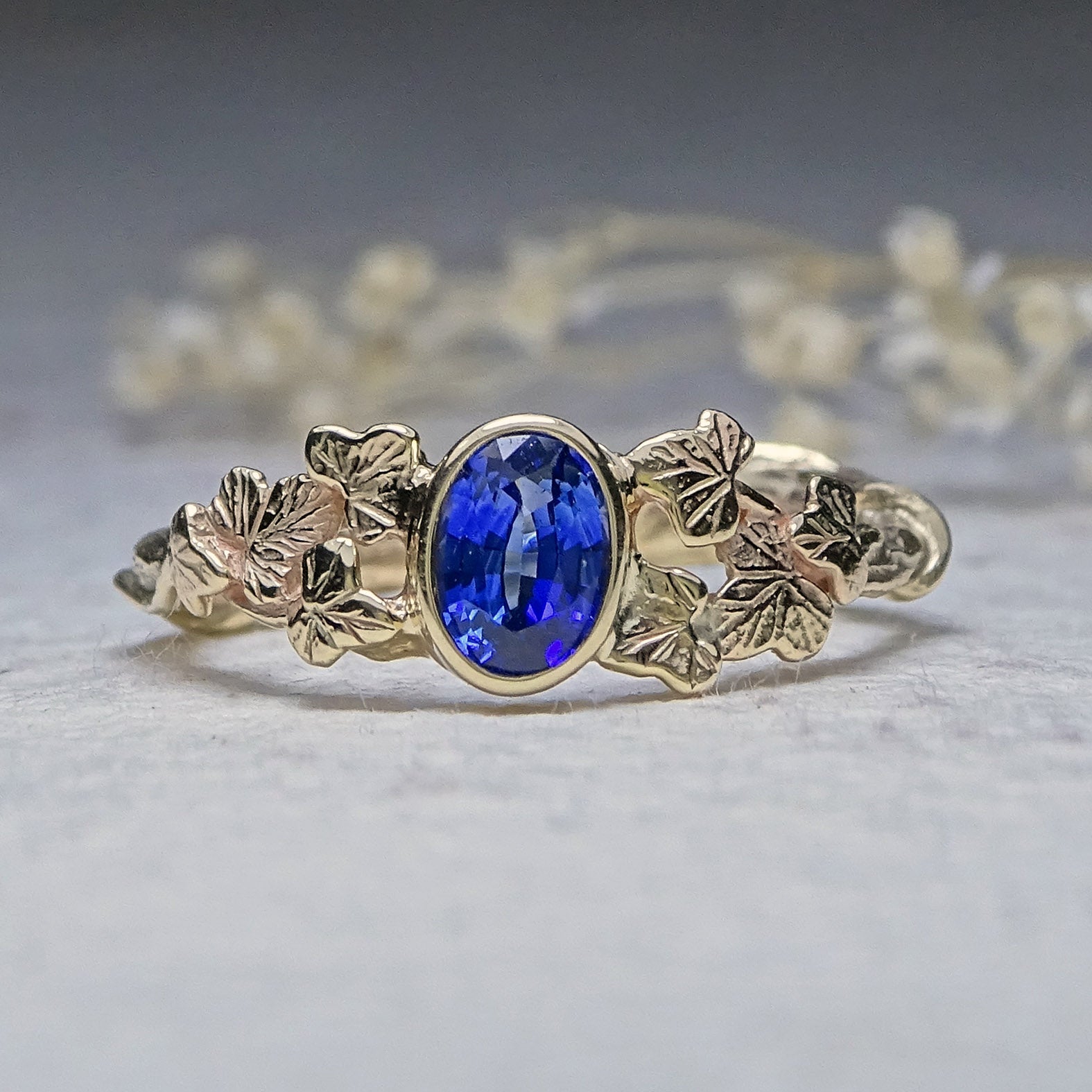 Entwining Ivy Leaves ring, 6mm x 4mm Sapphire, 9ct yellow gold