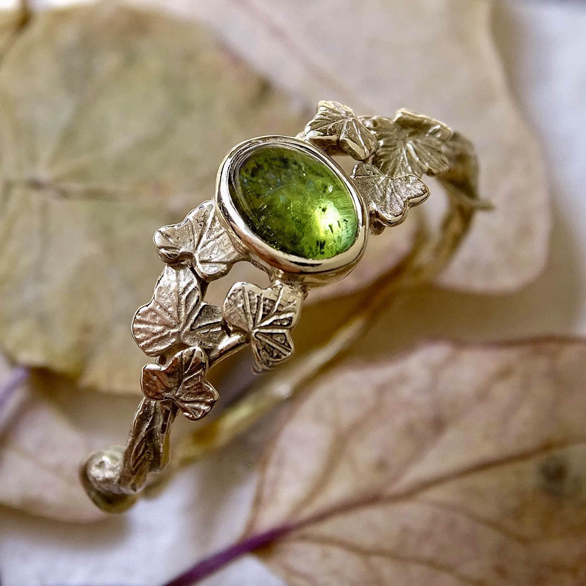 Entwining Ivy Leaves ring. Green Tourmaline cabochon, 9ct gold