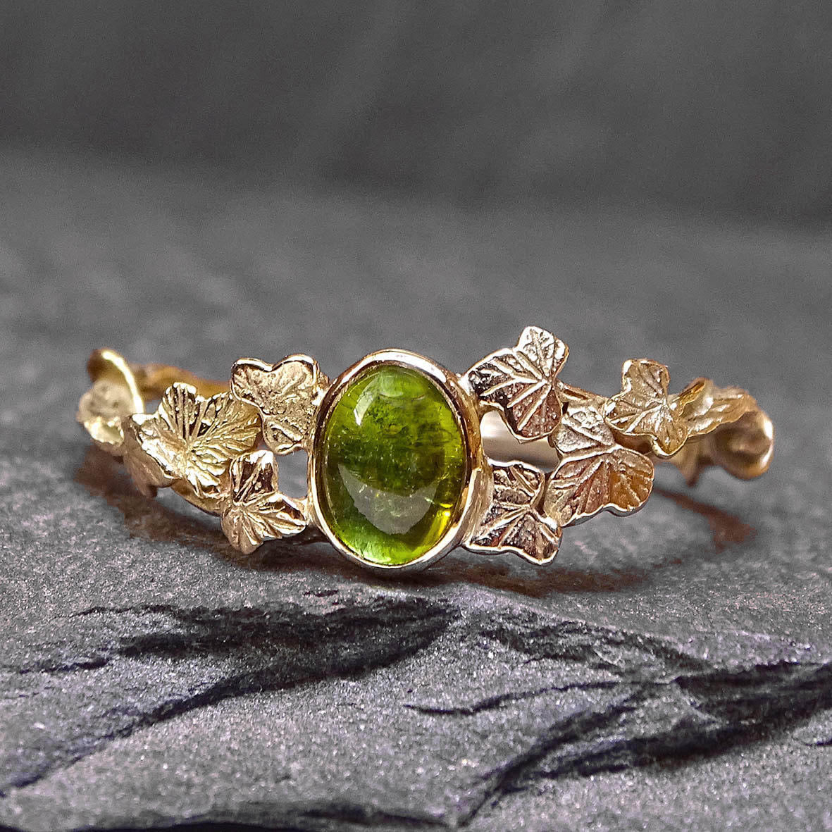 Entwining Ivy Leaves ring. Green Tourmaline cabochon, 9ct gold