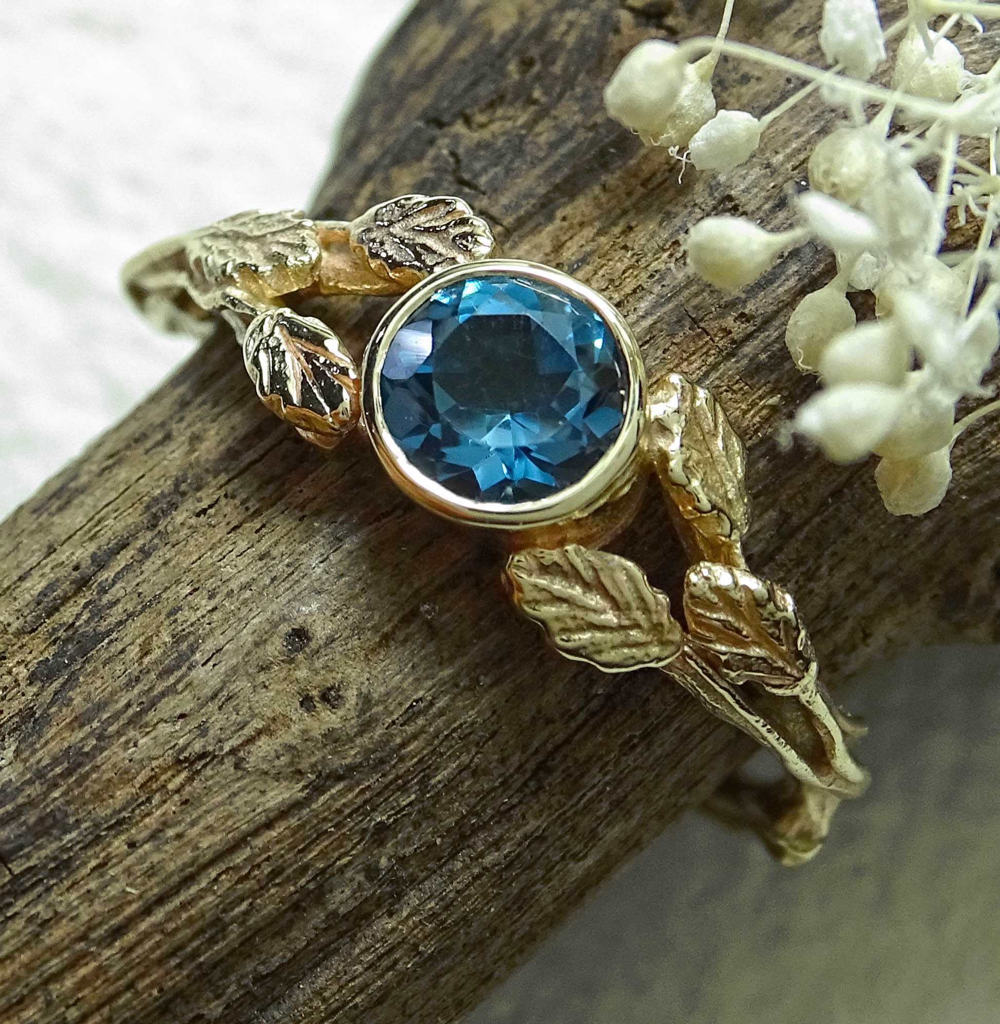 Entwining Leaves ring, London Blue Topaz, 5mm. 9ct gold