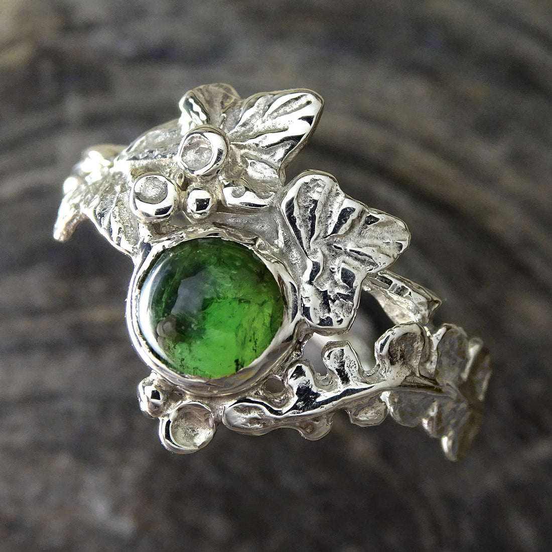 Entwining Fern and Ivy leaves ring, 5,5mm Green Tourmaline cabochon, 9ct white gold