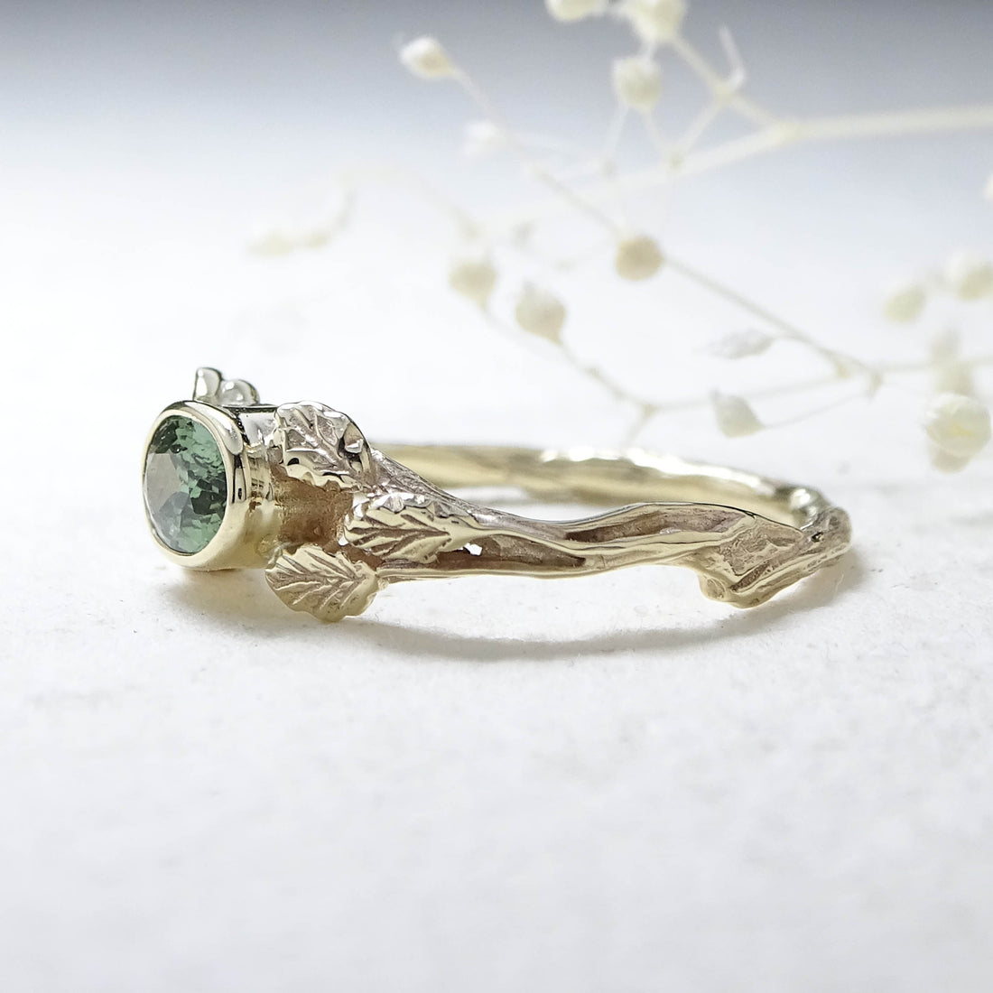 Entwining Leaves ring, 9ct yellow gold, 6mm x 4mm Green Sapphire