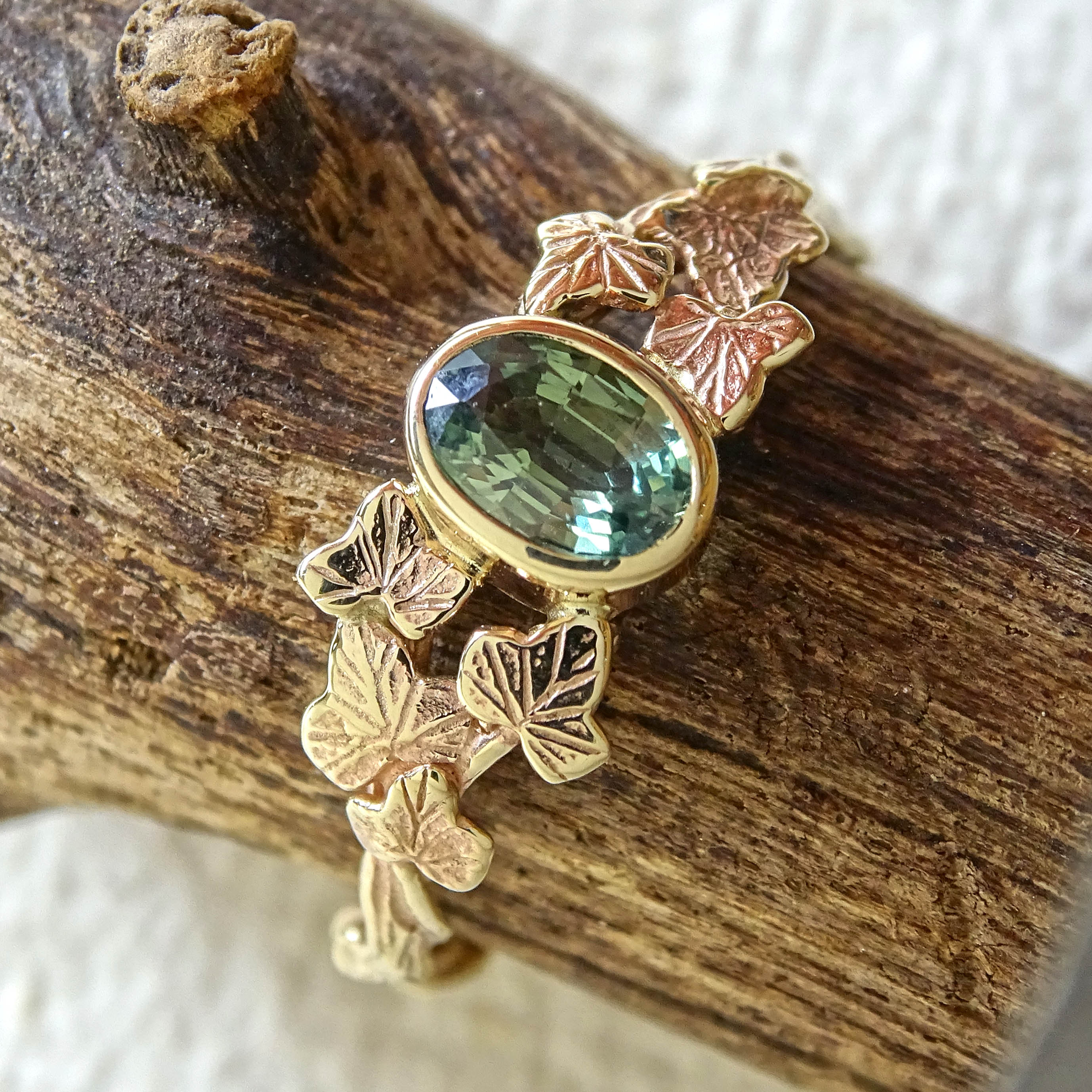 Entwining Ivy Leaves ring, 9ct yellow gold, 6mm x 4mm Green Sapphire