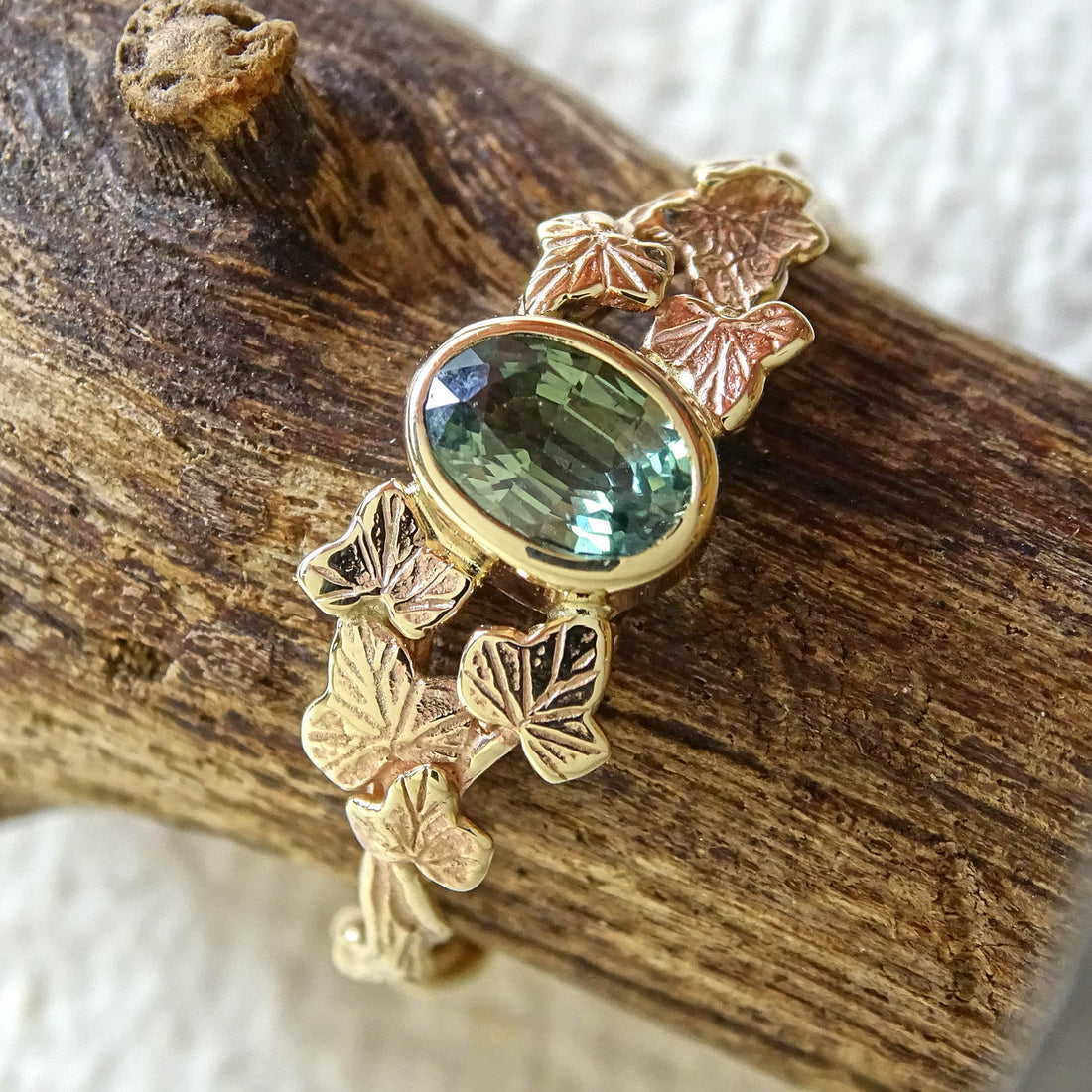 Entwining Ivy Leaves ring, 9ct yellow gold, 6mm x 4mm Green Sapphire