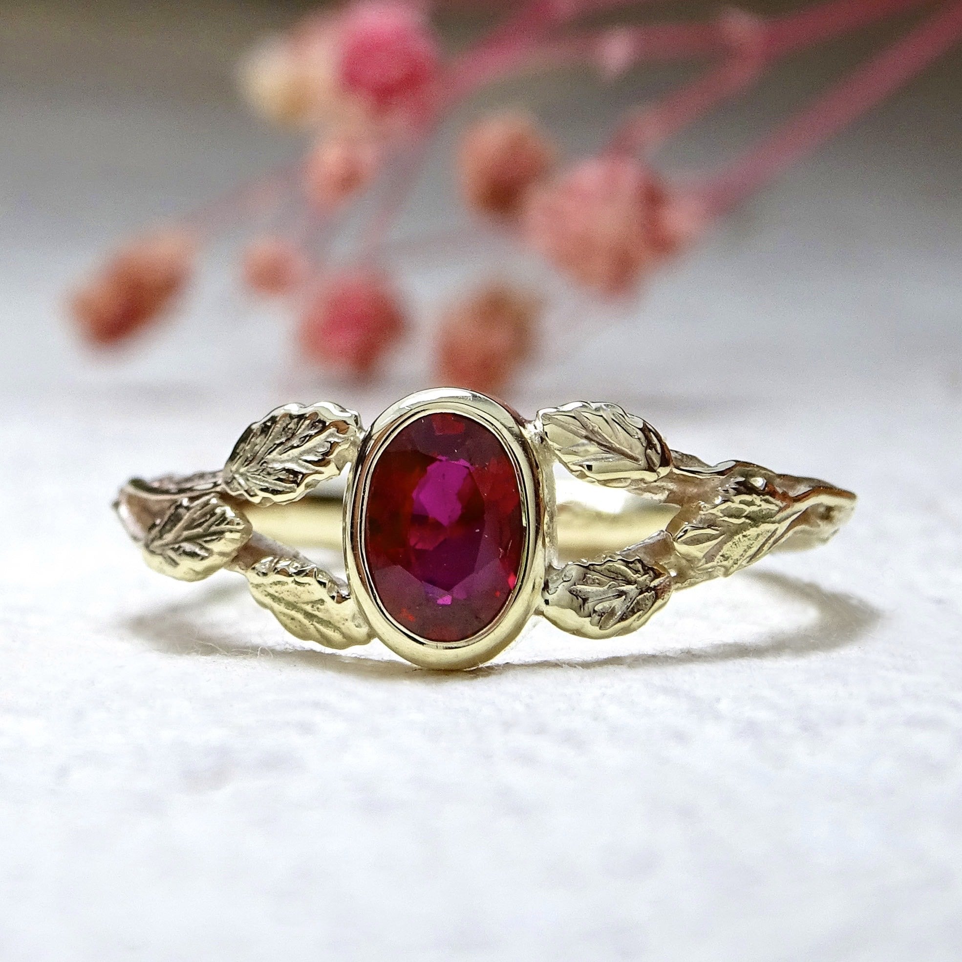 Entwining Leaves ring, 6mm x 4mm Ruby, 9ct yellow gold