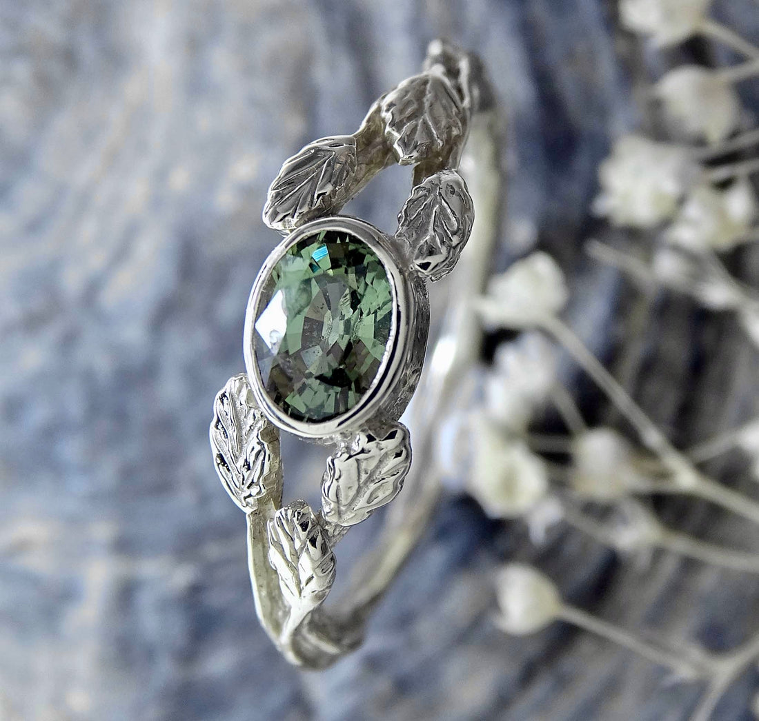 Entwining Leaves ring, 9ct white gold, 6mm x 4mm Green Sapphire