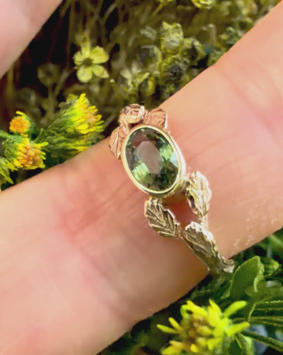 Entwining Leaves ring, 9ct yellow gold, 6mm x 4mm Green Sapphire