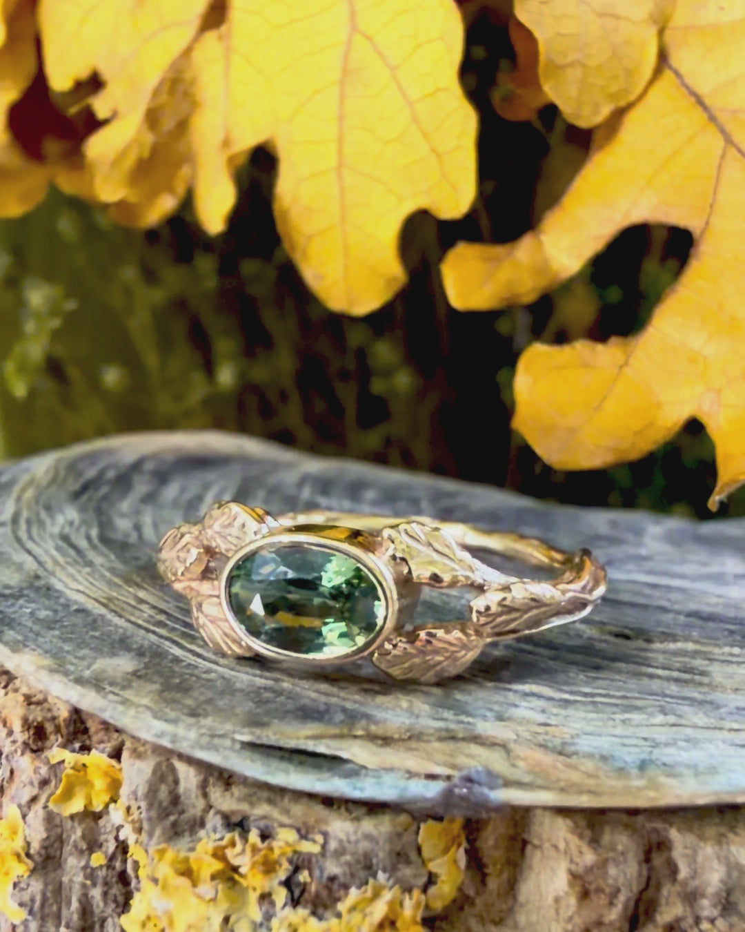 Entwining Leaves ring, 9ct yellow gold, 6mm x 4mm Green Sapphire